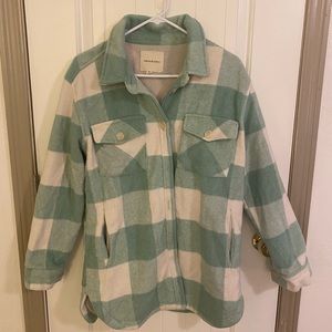 Medium mint colored checkered jacket. It’s from thread and supply.